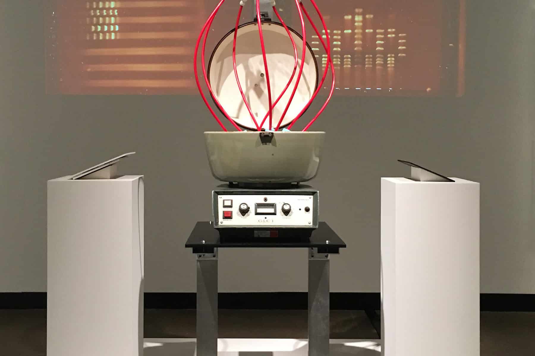 Paul Vanouse, America Project, 2016, spittoon and video projection.