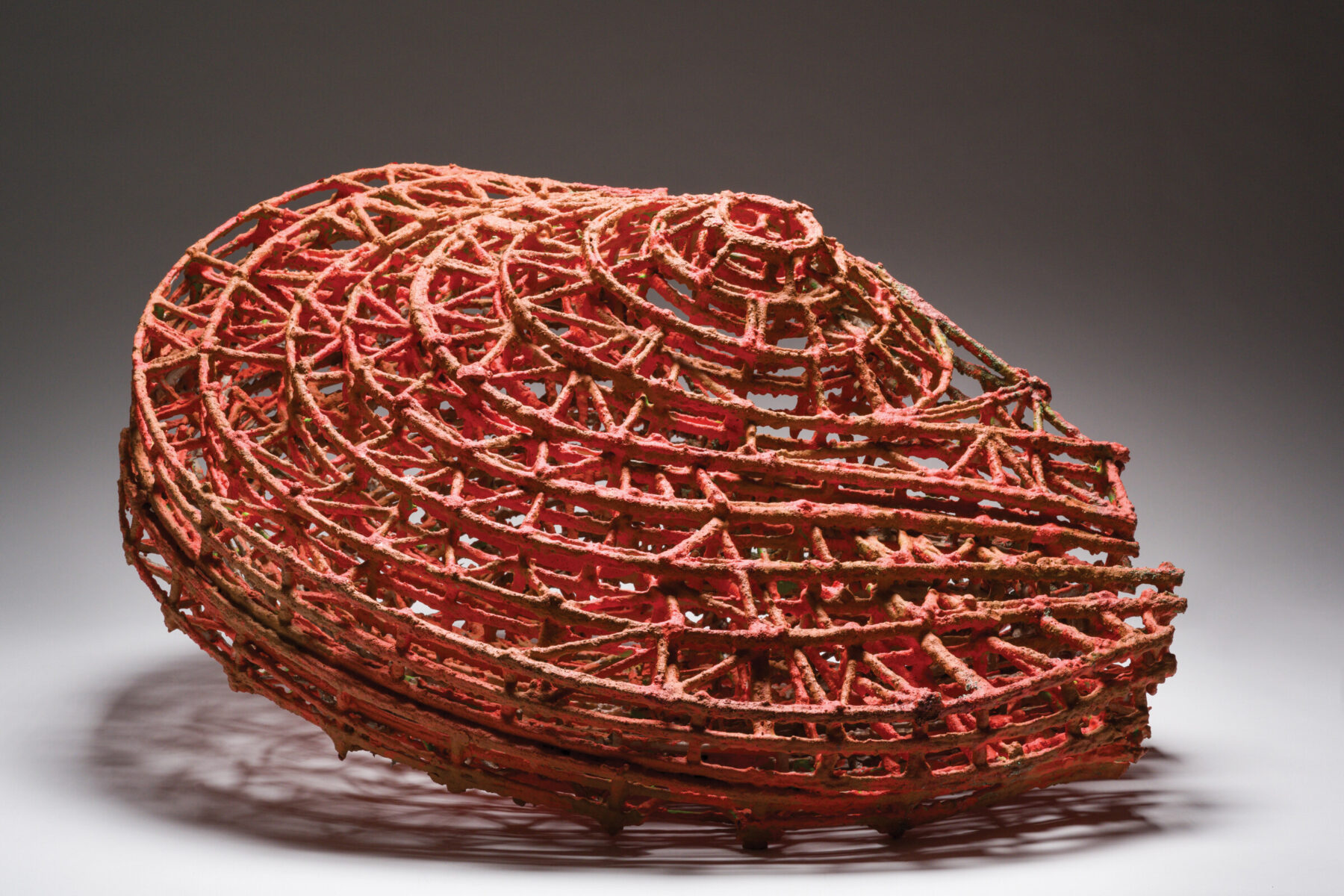 STEPHEN TALASNIK, Leaning Globe, 1998 - 2023; Painted basswood with metallic pigment,
28 x 40 x 22 inches (h x w x d)”
