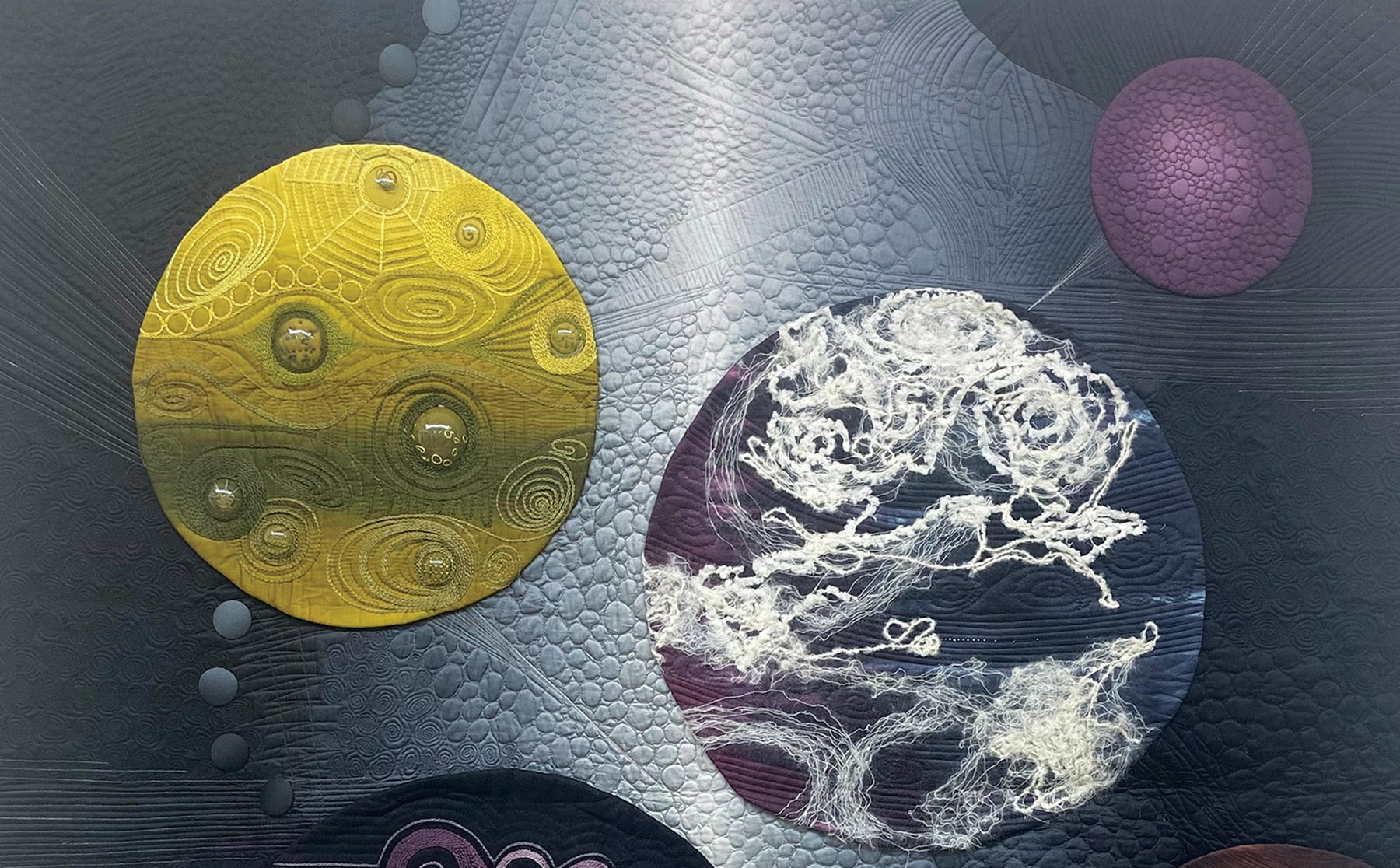 Mieko Washio, "Cosmos" (detail), 2020, appliquéd, machine quilted, hand quilted, hand embroidered, cotton, satin, yarn, 64 x 59 inches.