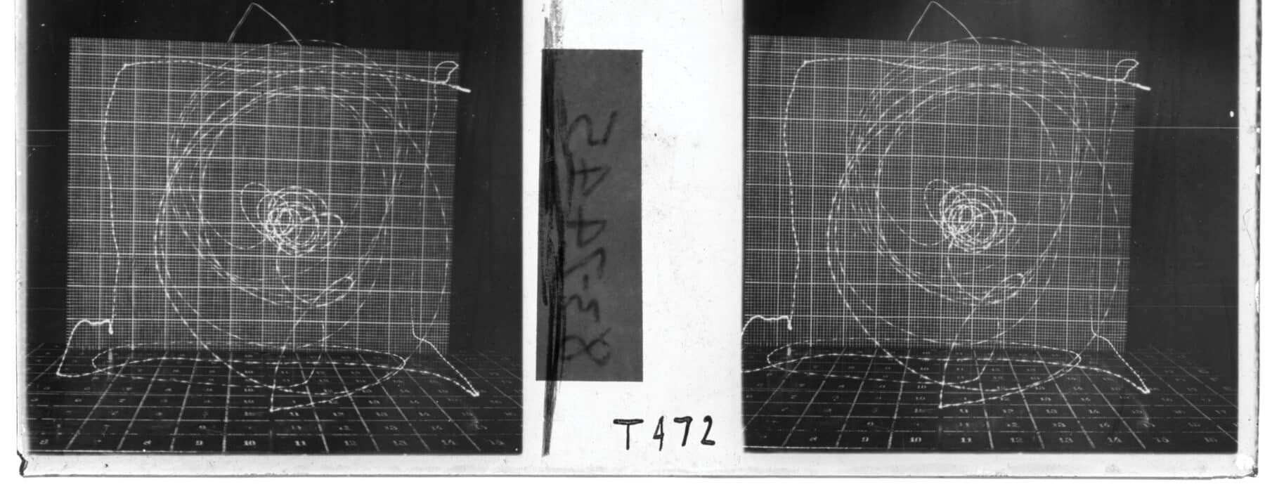 Frank and Lillian Gilbreth, Unidentified cyclegraph. Gridded table and gridded background.