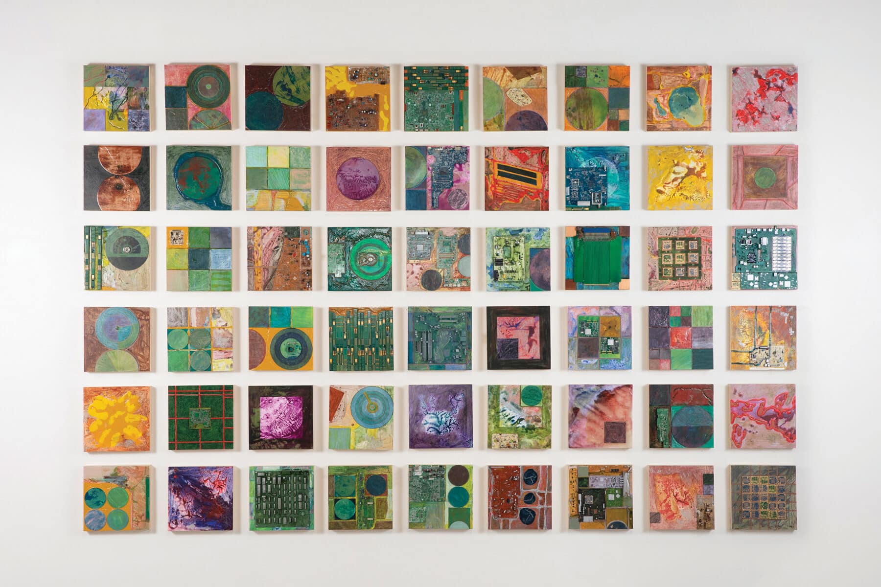Richelle Ellis, Life on the Grid, 2026, acrylic, oil pastels, circuit boards, wood on panel, 54 panels, each 12 x 12 x 3 inches.